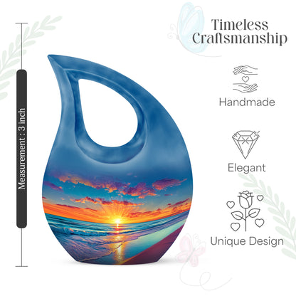 Powder Blue Beach Cremation Urn back view with polished surface - sacred cross merged with beach motif on metal - mini keepsake memorial for portion of cremation ashes