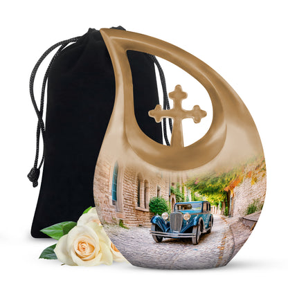 Gilded Gold Car Cremation Urn top-down view of secure threaded lid - sacred cross merged with car motif on metal - full-size 10 inch 200 cubic inch adult cremation urn