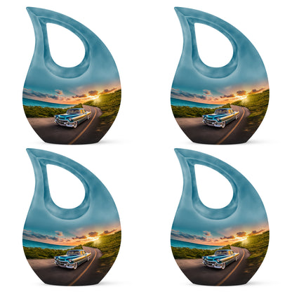 Powder Blue Car Cremation Urn lifestyle display on memorial shelf - sacred cross merged with car motif on metal - 10 inch aluminum urn for cremated remains