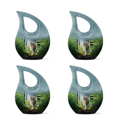 Glossy Black Cat Cremation Urn lifestyle display on memorial shelf - sacred cross merged with cat motif on metal - 10 inch aluminum urn for cremated remains