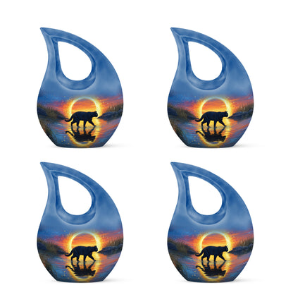 Azure Cat Cremation Urn lifestyle display on memorial shelf - sacred cross merged with cat motif on metal - 10 inch aluminum urn for cremated remains
