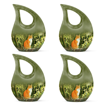 Hunter Green Cat Cremation Urn lifestyle display on memorial shelf - faith-inspired cross-drop urn with cat pattern - 10 inch aluminum urn for cremated remains