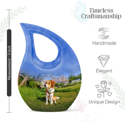 Icy Blue Dog Cremation Urn back view with polished surface - sacred cross merged with dog motif on metal - mini keepsake memorial for portion of cremation ashes