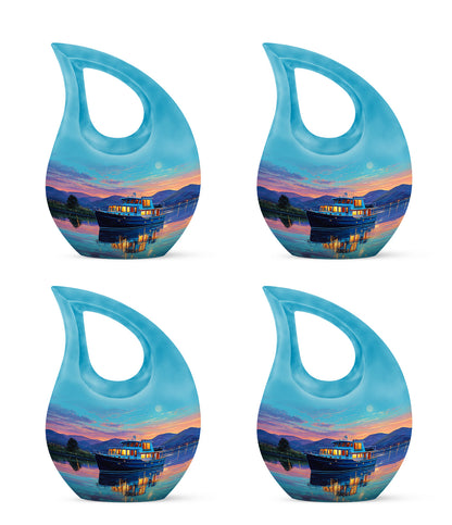 Sea Green Teal Boat Cremation Urn lifestyle display on memorial shelf - sacred cross merged with boat motif on metal - 10 inch aluminum urn for cremated remains