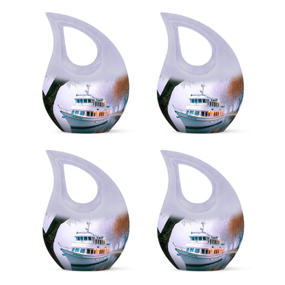 Porcelain White Boat Cremation Urn lifestyle display on memorial shelf - faith-inspired cross-drop urn with boat pattern - 10 inch aluminum urn for cremated remains