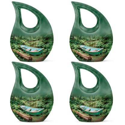 Forest Green Boat Cremation Urn lifestyle display on memorial shelf - devotional cross-drop boat engraving - 10 inch aluminum urn for cremated remains