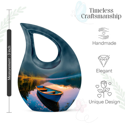 Vivid Teal Boat Cremation Urn back view with polished surface - devotional cross-drop boat engraving - mini keepsake memorial for portion of cremation ashes