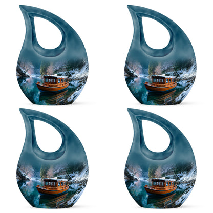 Vivid Blue Boat Cremation Urn lifestyle display on memorial shelf - devotional cross-drop boat engraving - 10 inch aluminum urn for cremated remains