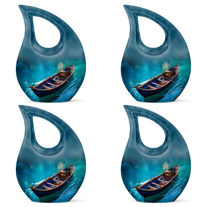 Twilight Blue Boat Cremation Urn lifestyle display on memorial shelf - faith-inspired cross-drop urn with boat pattern - 10 inch aluminum urn for cremated remains