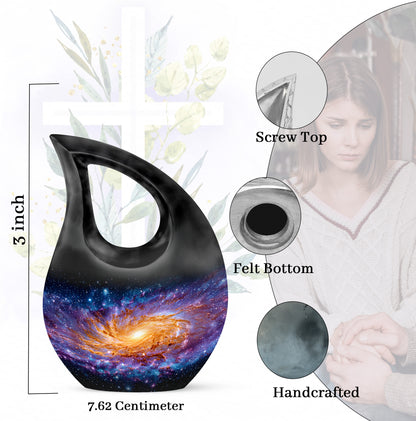 Midnight Black Galaxy Cremation Urn back view with polished surface - faith-inspired cross-drop urn with galaxy pattern - mini keepsake memorial for portion of cremation ashes