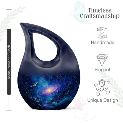Dusty Blue Galaxy Cremation Urn back view with polished surface - cross and galaxy combined in spiritual memorial design - mini keepsake memorial for portion of cremation ashes