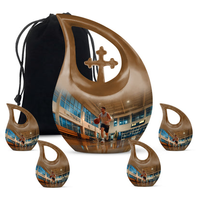 Gilded Gold Basketball Cremation Urn urn with complimentary velvet bag - cross and basketball combined in spiritual memorial design - memorial set with one large and four small urns