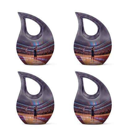Jet Black Basketball Cremation Urn lifestyle display on memorial shelf - sacred cross merged with basketball motif on metal - 10 inch aluminum urn for cremated remains