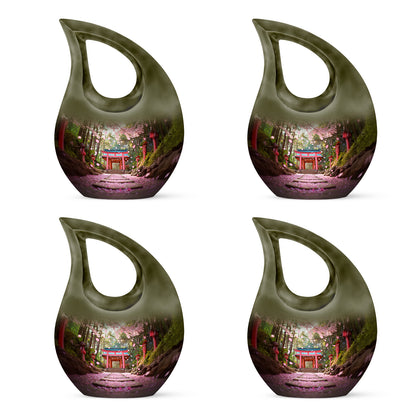Amber Gold Cherry Blossom Cremation Urn lifestyle display on memorial shelf - sacred cross merged with cherry blossom motif on metal - 10 inch aluminum urn for cremated remains