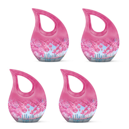 Icy Blue Cherry Blossom Cremation Urn lifestyle display on memorial shelf - cross and cherry blossom combined in spiritual memorial design - 10 inch aluminum urn for cremated remains