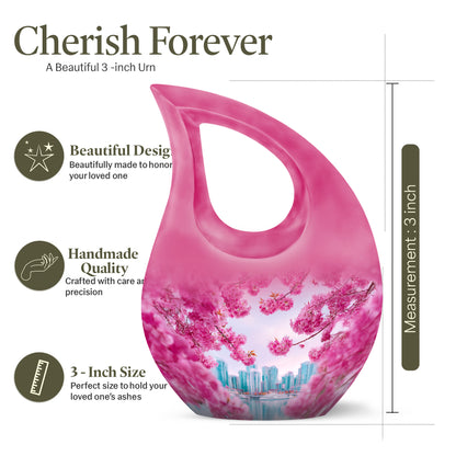 Pastel Pink Cherry Blossom Cremation Urn back view with polished surface - cross and cherry blossom combined in spiritual memorial design - mini keepsake memorial for portion of cremation ashes