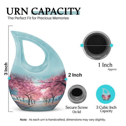 Vivid Teal Cherry Blossom Cremation Urn back view with polished surface - devotional cross-drop cherry blossom engraving - mini keepsake memorial for portion of cremation ashes