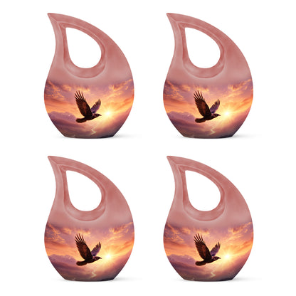 Salmon Pink Crow Cremation Urn lifestyle display on memorial shelf - faith-inspired cross-drop urn with crow pattern - 10 inch aluminum urn for cremated remains