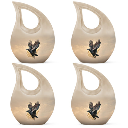 Harvest Gold Crow Cremation Urn lifestyle display on memorial shelf - devotional cross-drop crow engraving - 10 inch aluminum urn for cremated remains