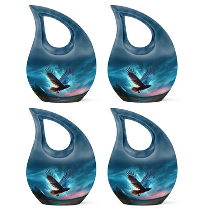 Sky Blue Crow Cremation Urn lifestyle display on memorial shelf - sacred cross merged with crow motif on metal - 10 inch aluminum urn for cremated remains