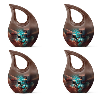 Sea Green Teal Drums Cremation Urn lifestyle display on memorial shelf - cross and drums combined in spiritual memorial design - 10 inch aluminum urn for cremated remains