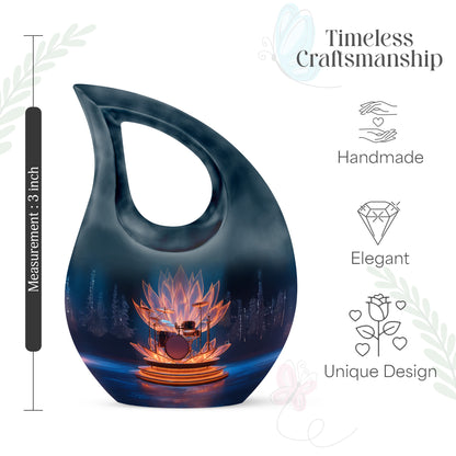 Navy Blue Drums Cremation Urn back view with polished surface - sacred cross merged with drums motif on metal - mini keepsake memorial for portion of cremation ashes