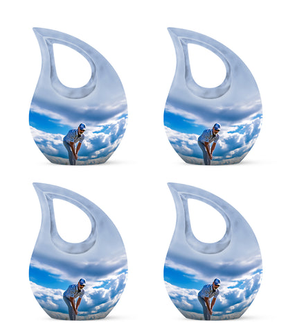 Calming Blue Golf Cremation Urn lifestyle display on memorial shelf - faith-inspired cross-drop urn with golf pattern - 10 inch aluminum urn for cremated remains