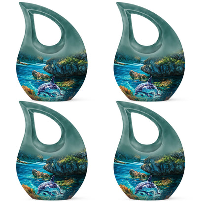 Verdant Green Dolphin Cremation Urn lifestyle display on memorial shelf - sacred cross merged with dolphin motif on metal - 10 inch aluminum urn for cremated remains