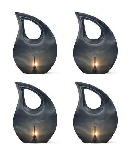 Jet Black Eiffel Tower Cremation Urn lifestyle display on memorial shelf - cross and eiffel tower combined in spiritual memorial design - 10 inch aluminum urn for cremated remains