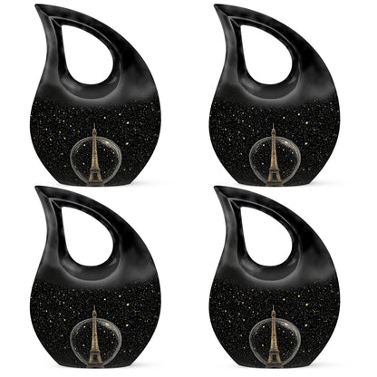 Deep Black Eiffel Tower Cremation Urn lifestyle display on memorial shelf - sacred cross merged with eiffel tower motif on metal - 10 inch aluminum urn for cremated remains