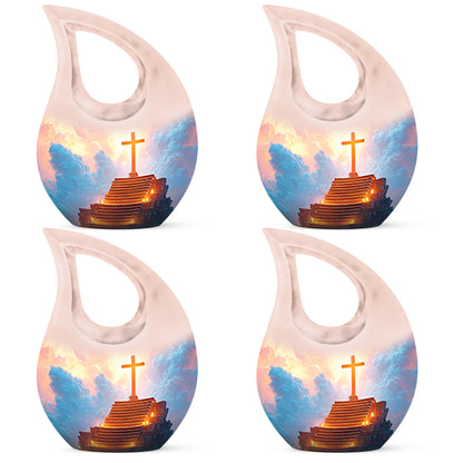 Dusty Blue Cross Cremation Urn lifestyle display on memorial shelf - sacred cross merged with cross motif on metal - 10 inch aluminum urn for cremated remains