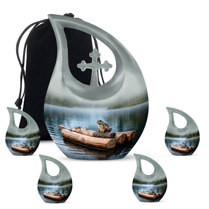 Gleaming Silver Frog Cremation Urn urn with complimentary velvet bag - sacred cross merged with frog motif on metal - memorial set with one large and four small urns
