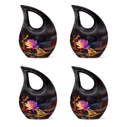 Onyx Black Frog Cremation Urn lifestyle display on memorial shelf - devotional cross-drop frog engraving - 10 inch aluminum urn for cremated remains