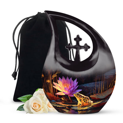 Deep Black Frog Cremation Urn top-down view of secure threaded lid - sacred cross merged with frog motif on metal - full-size 10 inch 200 cubic inch adult cremation urn