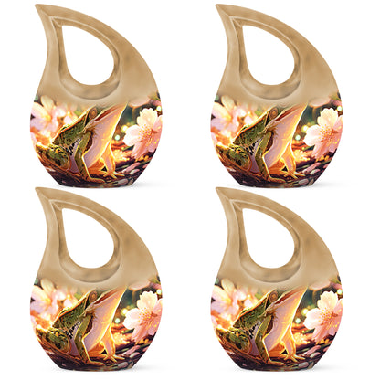 Champagne Gold Frog Cremation Urn lifestyle display on memorial shelf - cross and frog combined in spiritual memorial design - 10 inch aluminum urn for cremated remains