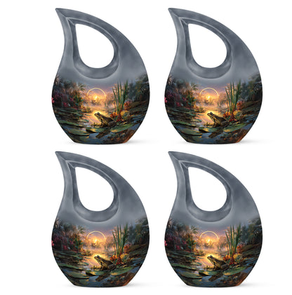Pewter Gray Frog Cremation Urn lifestyle display on memorial shelf - cross and frog combined in spiritual memorial design - 10 inch aluminum urn for cremated remains