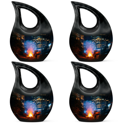 Midnight Black Campfire Cremation Urn lifestyle display on memorial shelf - devotional cross-drop campfire engraving - 10 inch aluminum urn for cremated remains