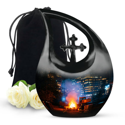 Glossy Black Campfire Cremation Urn top-down view of secure threaded lid - sacred cross merged with campfire motif on metal - full-size 10 inch 200 cubic inch adult cremation urn