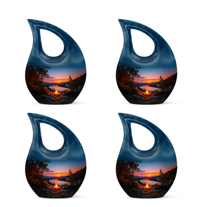 Sky Blue Campfire Cremation Urn lifestyle display on memorial shelf - sacred cross merged with campfire motif on metal - 10 inch aluminum urn for cremated remains