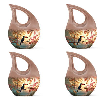 Warm Gold Hornbill Cremation Urn lifestyle display on memorial shelf - devotional cross-drop hornbill engraving - 10 inch aluminum urn for cremated remains