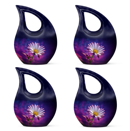 Twilight Blue Daisy Cremation Urn lifestyle display on memorial shelf - faith-inspired cross-drop urn with daisy pattern - 10 inch aluminum urn for cremated remains