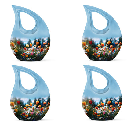 Celestial Blue Garden Tulip Cremation Urn lifestyle display on memorial shelf - cross and garden tulip combined in spiritual memorial design - 10 inch aluminum urn for cremated remains