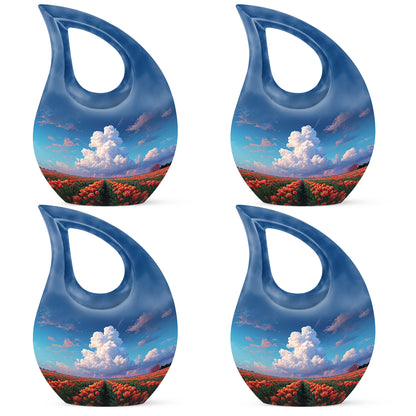 Dusty Blue Garden Tulip Cremation Urn lifestyle display on memorial shelf - sacred cross merged with garden tulip motif on metal - 10 inch aluminum urn for cremated remains