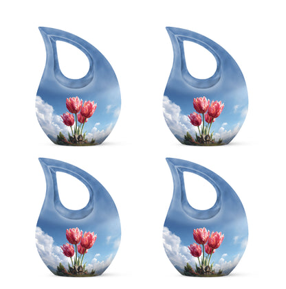 Calming Blue Garden Tulip Cremation Urn lifestyle display on memorial shelf - devotional cross-drop garden tulip engraving - 10 inch aluminum urn for cremated remains