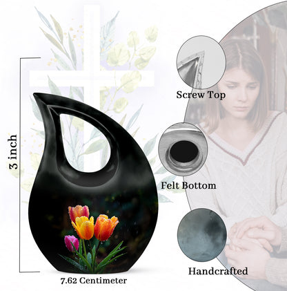 Midnight Black Garden Tulip Cremation Urn back view with polished surface - devotional cross-drop garden tulip engraving - mini keepsake memorial for portion of cremation ashes