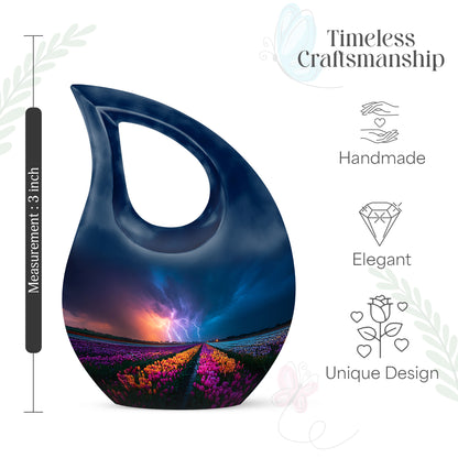 Powder Blue Garden Tulip Cremation Urn back view with polished surface - sacred cross merged with garden tulip motif on metal - mini keepsake memorial for portion of cremation ashes
