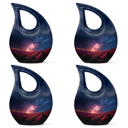 Misty Blue Garden Tulip Cremation Urn lifestyle display on memorial shelf - sacred cross merged with garden tulip motif on metal - 10 inch aluminum urn for cremated remains