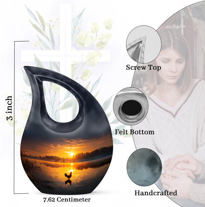 Charcoal Black Hen Cremation Urn back view with polished surface - faith-inspired cross-drop urn with hen pattern - mini keepsake memorial for portion of cremation ashes