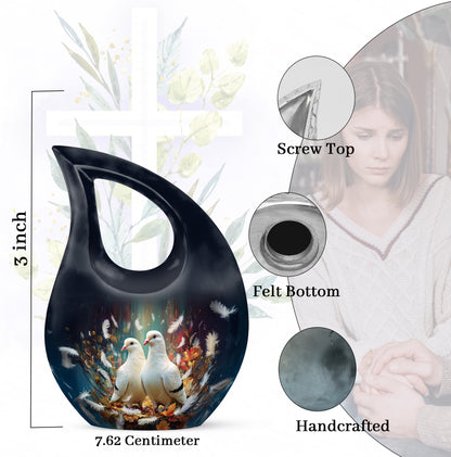Deep Black Dove Cremation Urn back view with polished surface - sacred cross merged with dove motif on metal - mini keepsake memorial for portion of cremation ashes