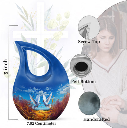 Twilight Blue Dove Cremation Urn back view with polished surface - faith-inspired cross-drop urn with dove pattern - mini keepsake memorial for portion of cremation ashes